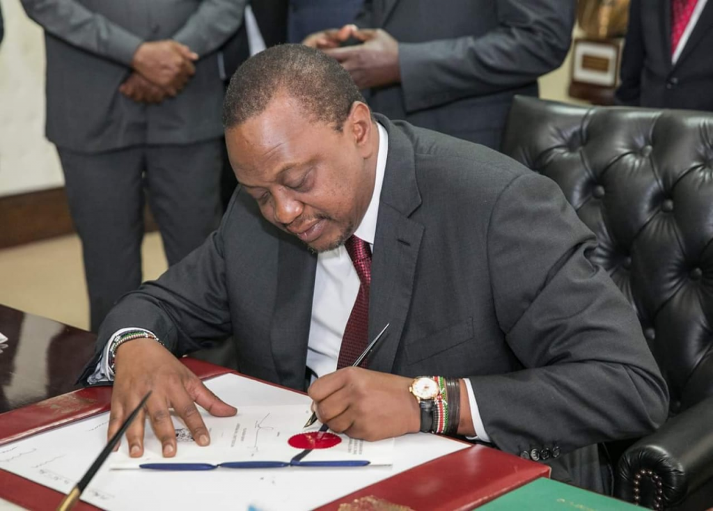 President Uhuru Kenyatta signs three Bills into law